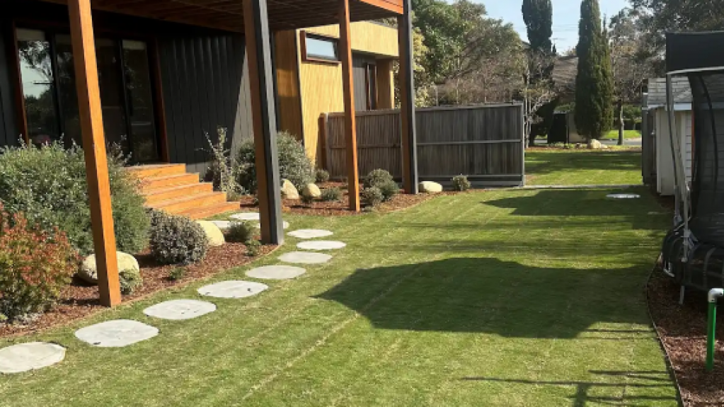 Mt Eliza backyard renovation featuring freshly laid TifTuf Bermuda turf.