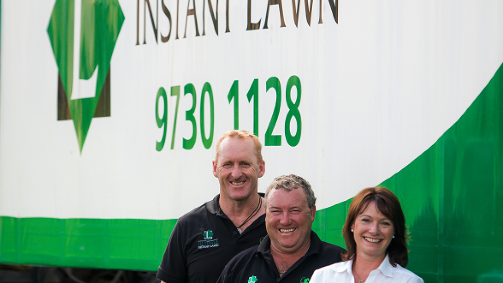 Our Lilydale Instant Lawn staff posing in front of our delivery truck. 
